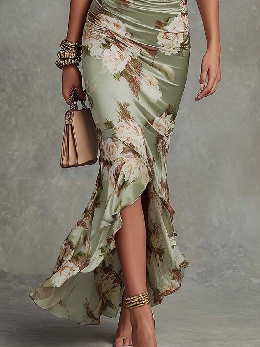Anna | Asymmetrical long satin dress in green with V-neck, bell sleeves, and floral pattern